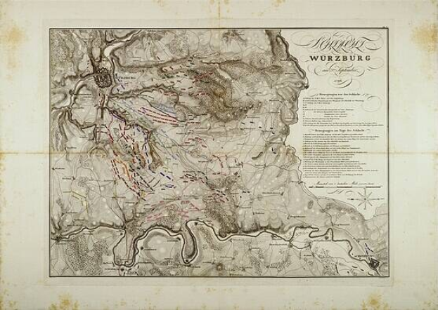 Ausführliche alte Karte von Würzburg, Deutschland, mit Straßen, Gebäuden und Sehenswürdigkeiten mit beschreibendem Text.
