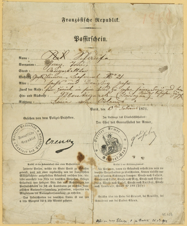 Altes deutsches Regierungsdokument mit einem kreisrunden Stempel auf gelbem Papier.