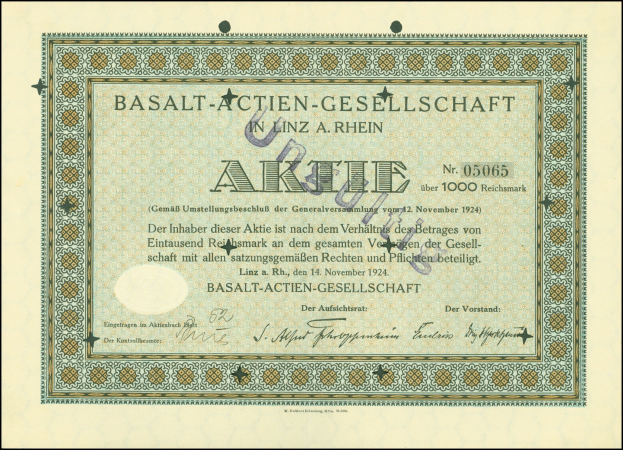 Rahmung alter Aktienurkunde ausgestellt von Basalt-Actien-Gesellschaft in Linz, Deutschland mit sichtbarem Text.