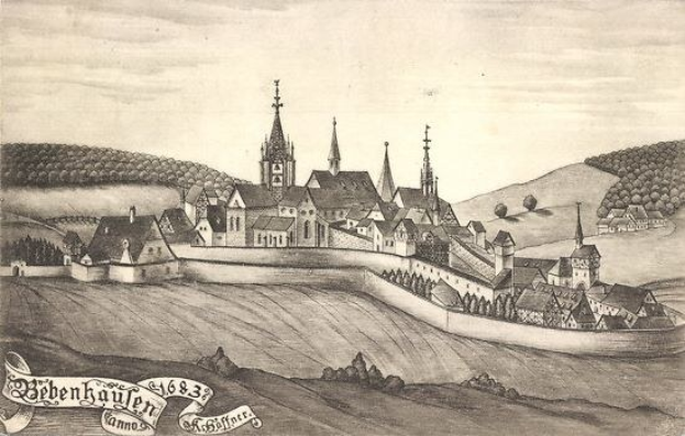 Schwarz-weiß-Zeichnung einer Stadt mit einem Schloss in der Mitte, umgeben von Häusern, Bäumen, Hügeln und Himmel, beschriftet mit «Bayerisch» unten.