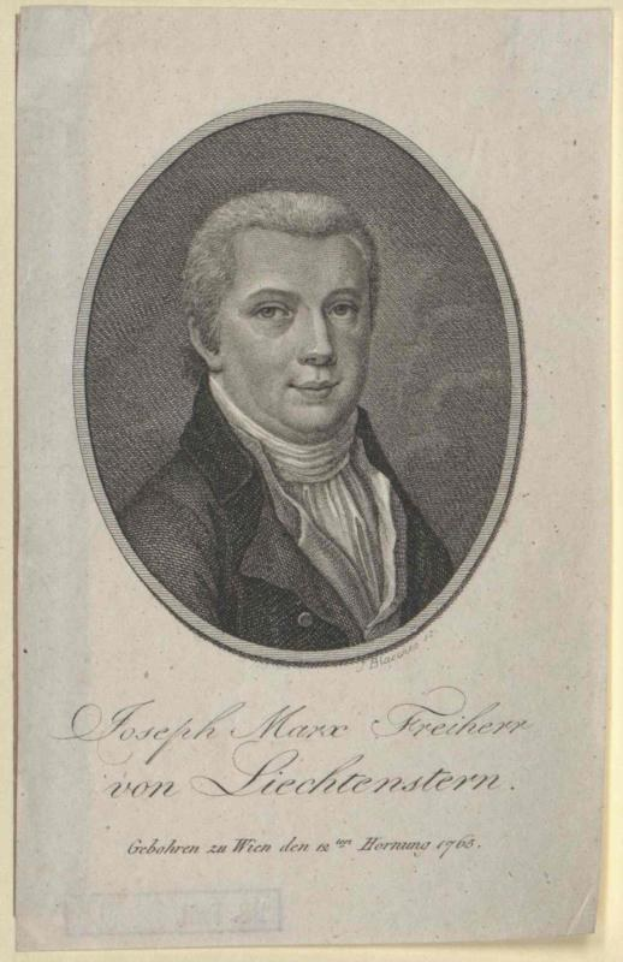Portrait von Joseph Marx Freicher von Liechtenstein, einem deutschen Komponisten, in einem schwarzen Anzug und weißem Hemd mit ernster Miene, hält ein Blatt Papier.